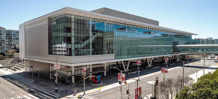A Large Building With A Road In Front Of It